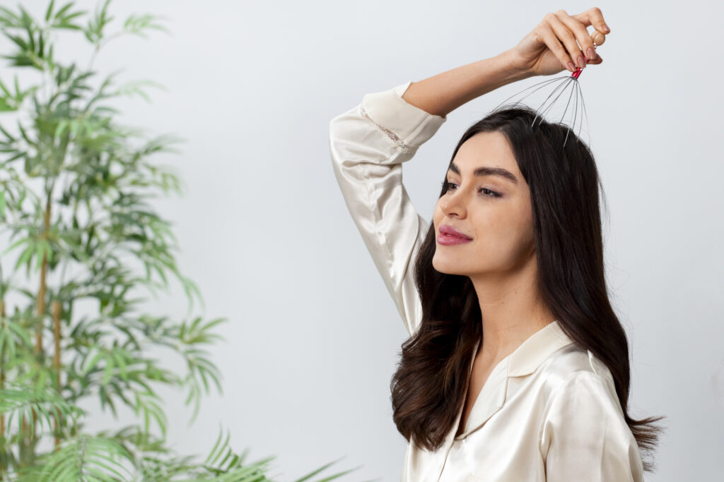 woman doing herself scalp massage (1)