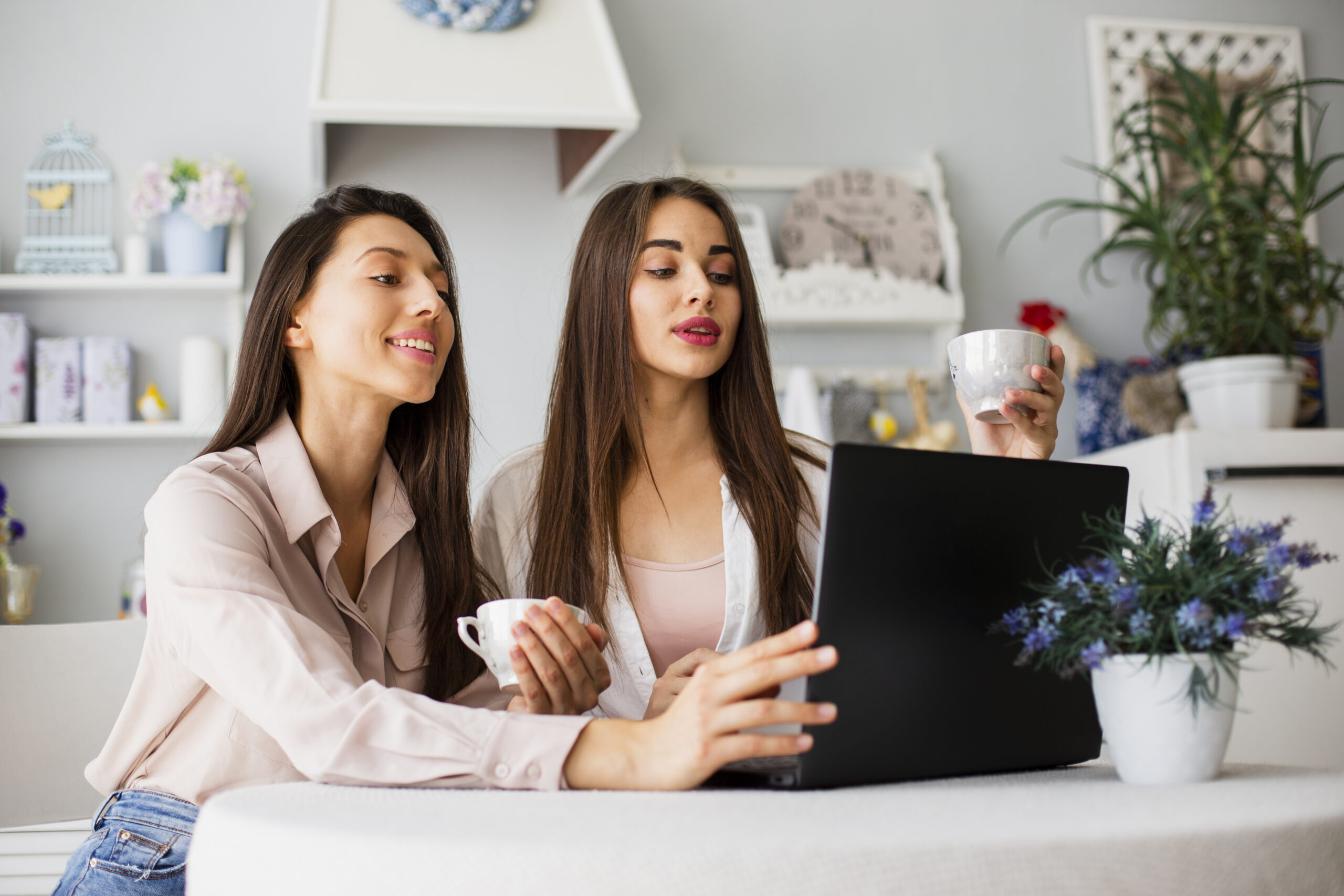young women working laptop home